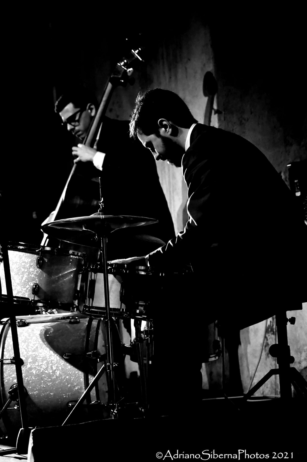 Marco Betti playing the drums and Alessandro Germini playing the bass